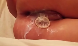 Teen with a efficacious condom up the ass