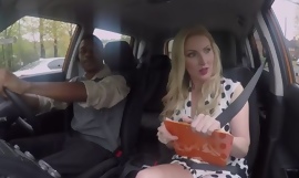 Busty driving school instructor pleasuring black dude in the car