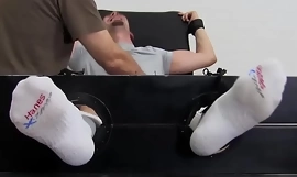 Restrained Angelo endures body and feet tickling from dom