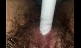 Hairy bitch fucks herself with a makeup brush