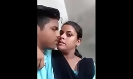 Indian school girl outdoor kissing