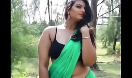 Mallu beautyqueen showing turns with an increment of cleavage