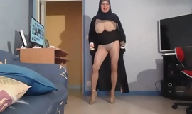 Veiled Muslim woman with big tits