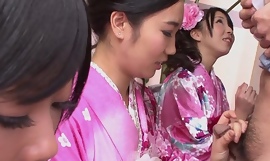 Four geishas engulfing on duo alone cock